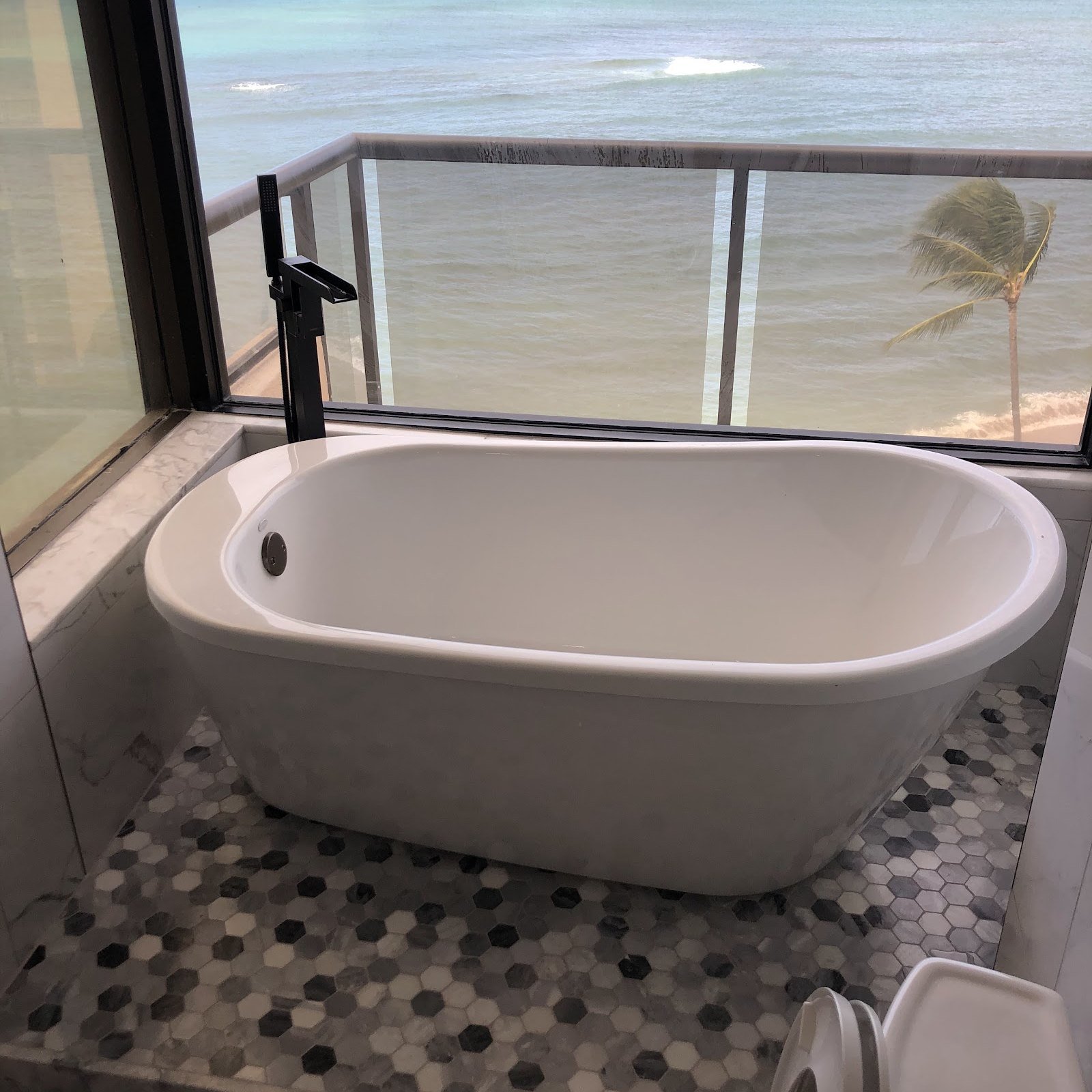 A soaking tub set and plumbed in a finished bathroom